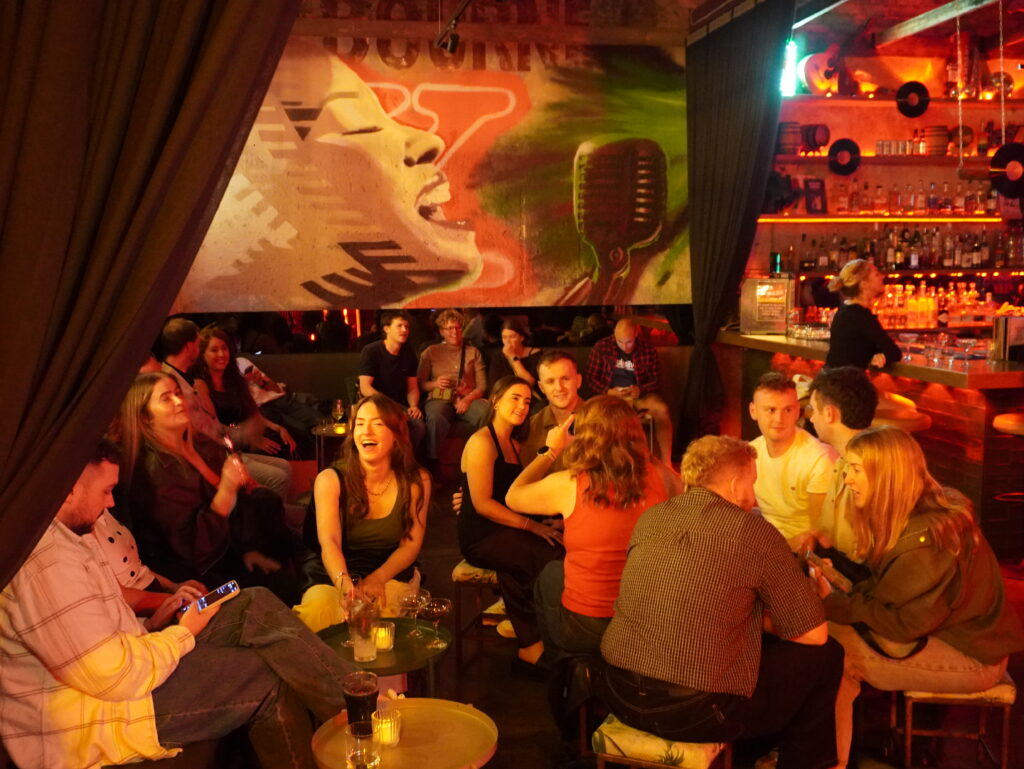 Birthday party guests enjoying live music at Baxter's Live Fitzroy